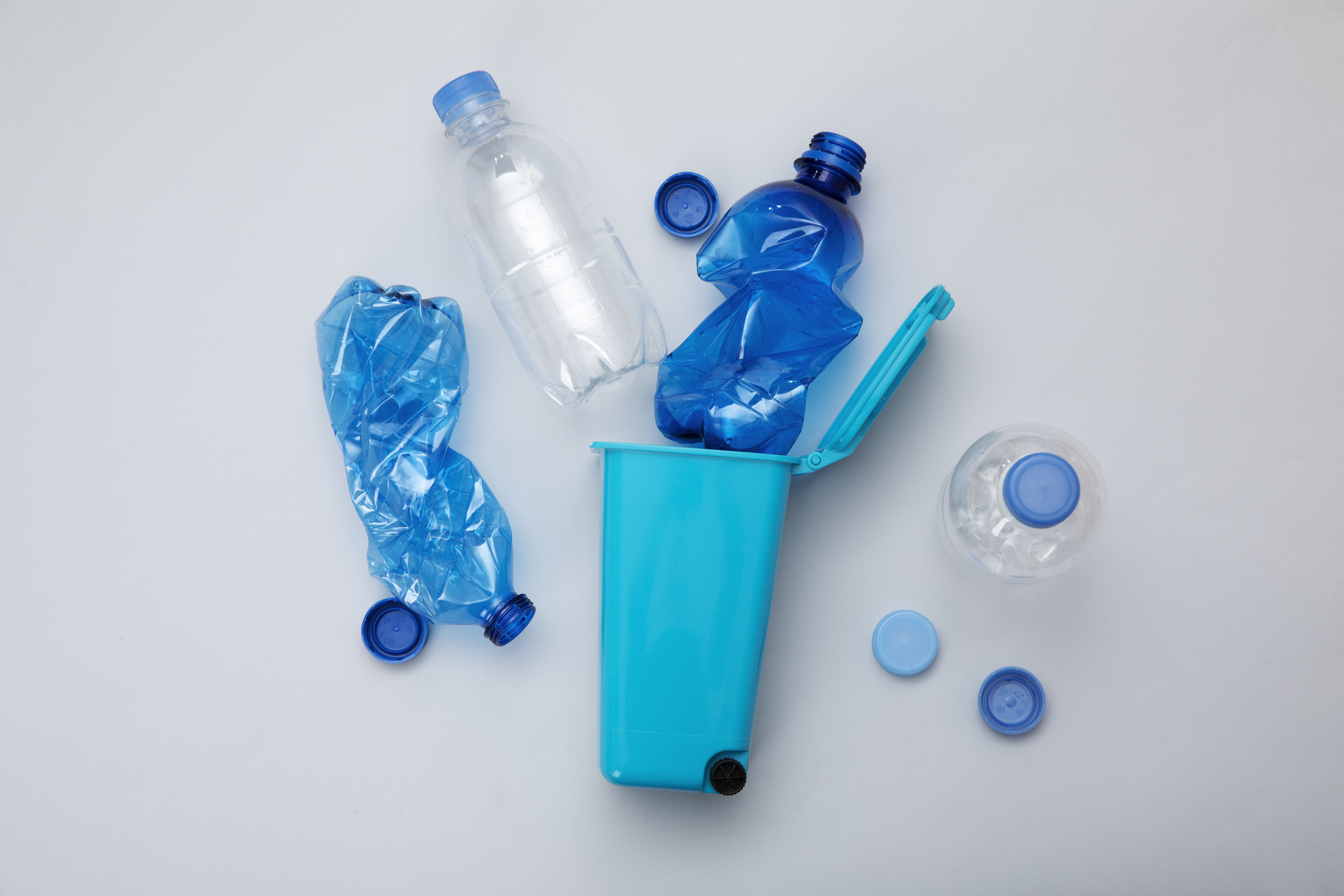 top-view-plastic-bottles-bin-arrangement